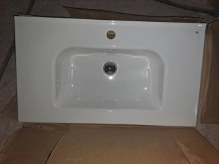 Lavabo porcelana 80cm con válvula plateada