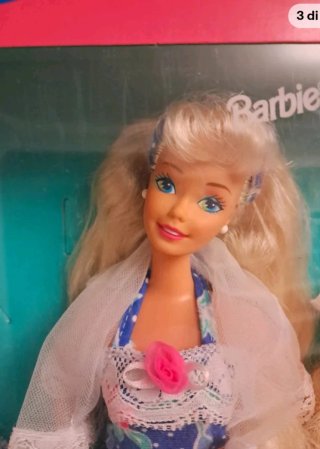 Barbie Sharin' Sisters bambole e vestiti