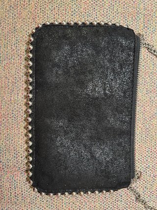 Bolso negro Zara con cadena