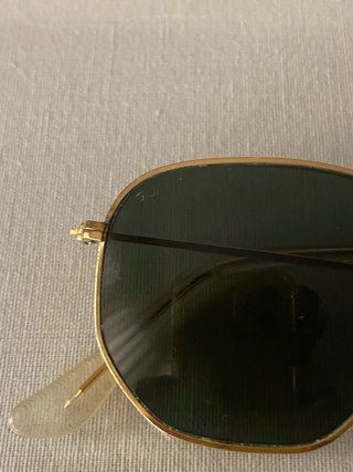 Gafas de sol Ray-Ban doradas y verdes
