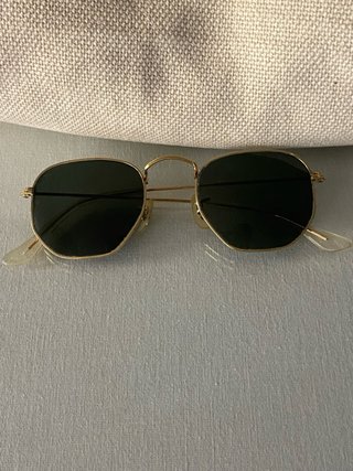 Gafas de sol Ray-Ban doradas y verdes