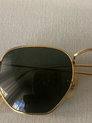 Gafas de sol Ray-Ban doradas y verdes