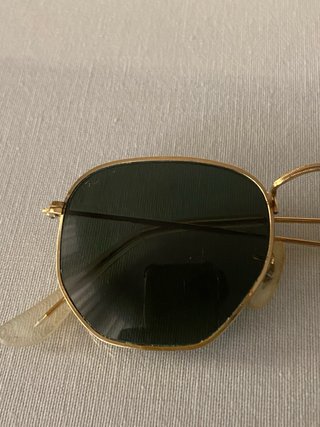 Gafas de sol Ray-Ban doradas y verdes