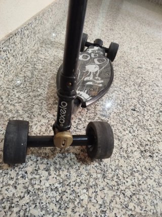 Patinete Oxelo 4 ruedas con manillar