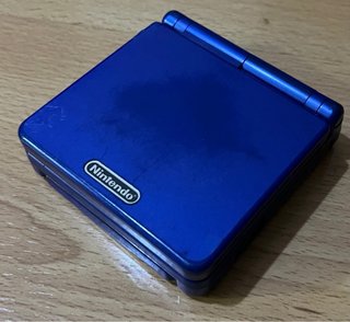 Game Boy Advance SP + Pokémon Zafiro + Rojo Fuego