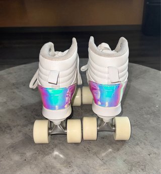 Patines 4 ruedas talla 38 + protecciones + mochila