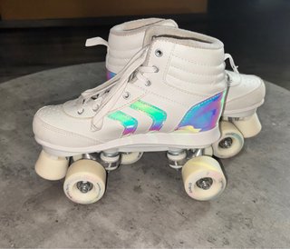 Patines 4 ruedas talla 38 + protecciones + mochila