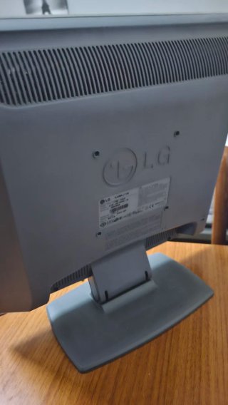 2 Monitores, Philips Negro y LG gris