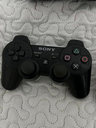 PS3 Slim con 2 mandos y 1 juego