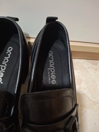 Mocasines negros con cadena