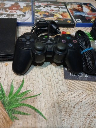 Playstation 2 Slim + 5 Juegos