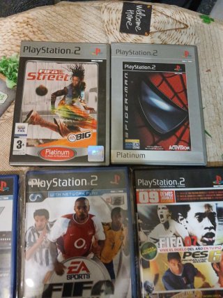 Playstation 2 Slim + 5 Juegos