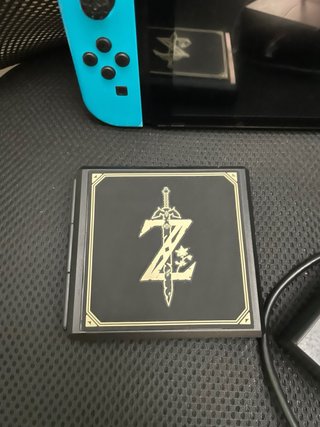 Nintendo Switch + Juegos + estuche zelda