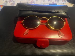 Gafas vintage Ray-Ban Gold, diseño ovalado en dora