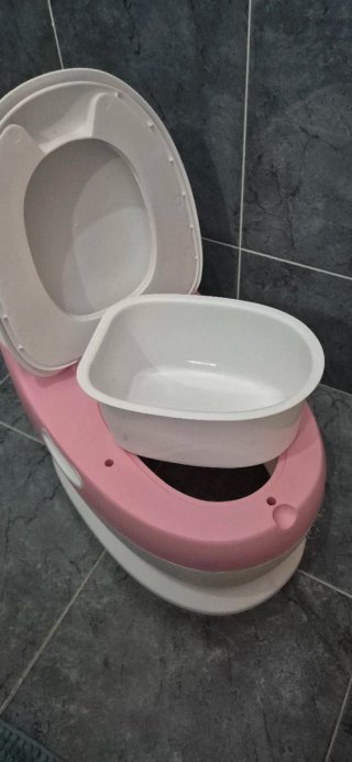 Orinal infantil rosa y blanco