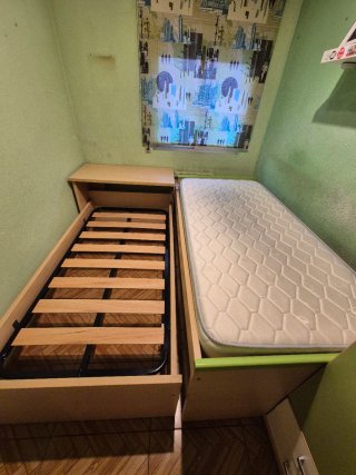 Cama individual con cajones y cama corredera.