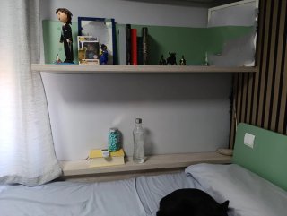 Habitación juvenil con cama nido.