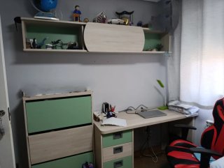 Habitación juvenil con cama nido.