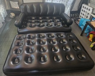 Sofá hinchable negro,se hace cama tambien