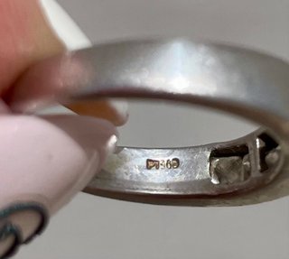 Anillo Platino con 7 Diamantes talla Princesa