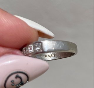 Anillo Platino con 7 Diamantes talla Princesa