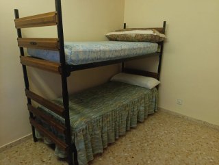 Litera de madera  con colchón incluido y colcha