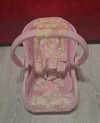 Silla de paseo para muñecas rosa