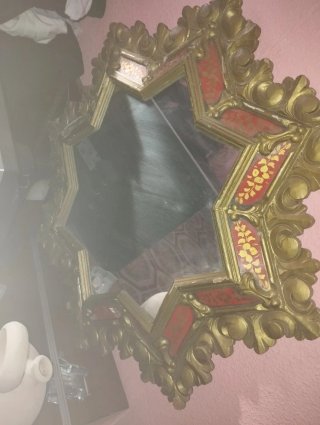 Espejo estrella dorado y rojo