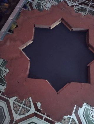 Espejo estrella dorado y rojo