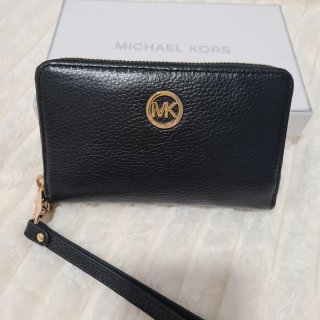 Cartera Michael Kors Negra y Dorada
