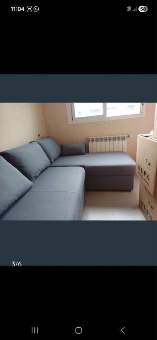Sofá modular gris de tela