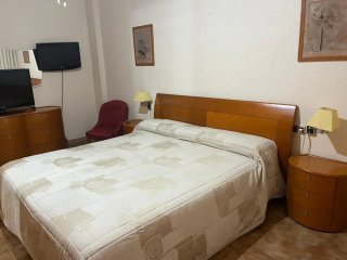 Cama doble madera y tela