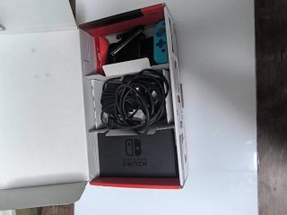 Nintendo Switch Caja Joy-Con Naranja y Azul