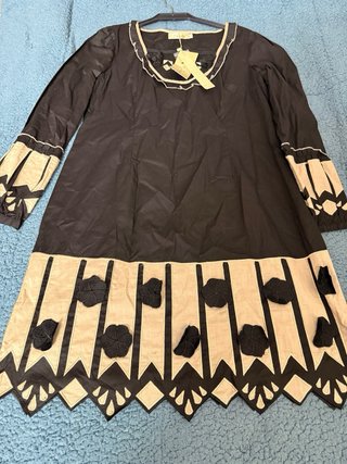 Vestido morado plisado manga larga