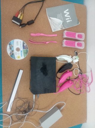 Consola Wii con accesorios y juego