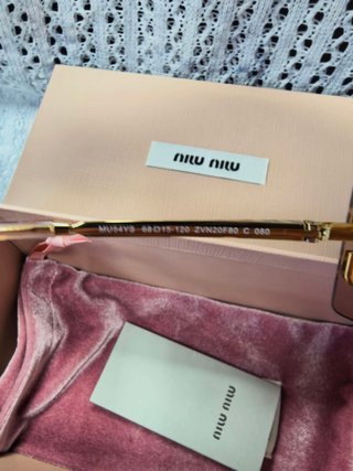 Gafas de sol Miu Miu doradas y rosas