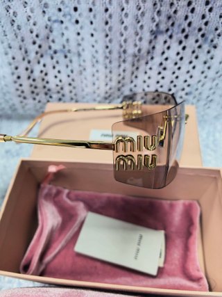 Gafas de sol Miu Miu doradas y rosas