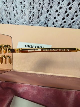 Gafas de sol Miu Miu doradas y rosas