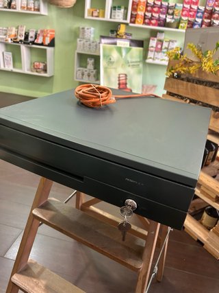 Cajón de monedas con apertura automática