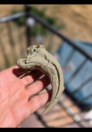 Réplica Garra Velociraptor Fósil