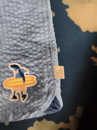 Bañador niño azul con estampado surf