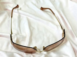 Gafas de sol Miu Miu Marrón y Dorado