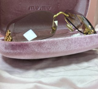 Gafas de sol Miu Miu Marrón y Dorado