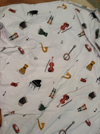Cama infantil con todos los téxtiles y accesorios