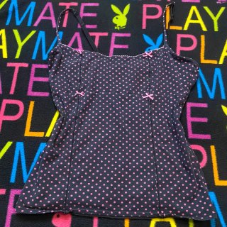 Top de lunares rosa y negro con lazos