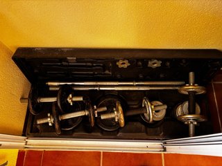 Juego de pesas de acero con maletín