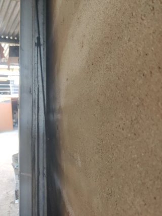 Puerta de garaje metálica con puerta de paso