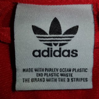 Chaqueta Adidas roja con logo multicolor Talla M