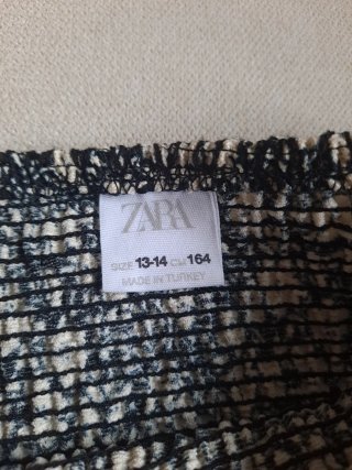 Falda mini Zara floral volantes talla13/14