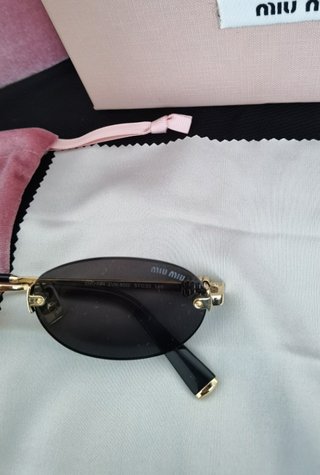 Gafas de sol Miu Miu originales modelo oval dorado